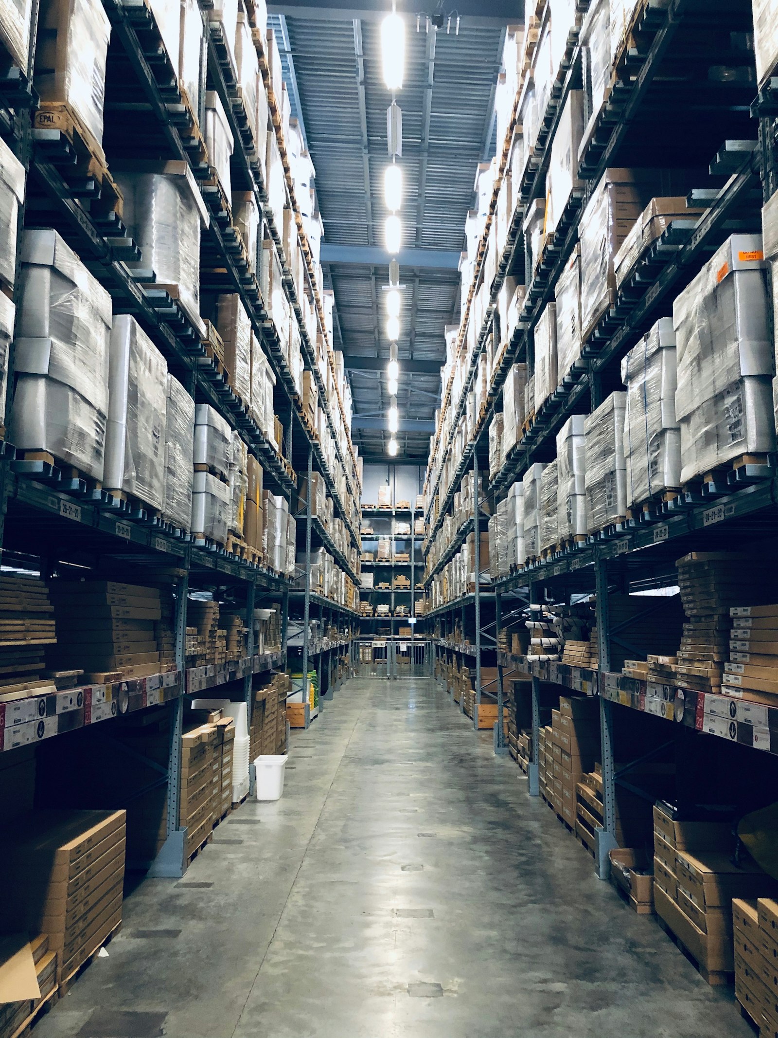 Modern high-bay distribution warehouse with pallet racks
